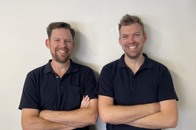 A photo of two Airquip employees.